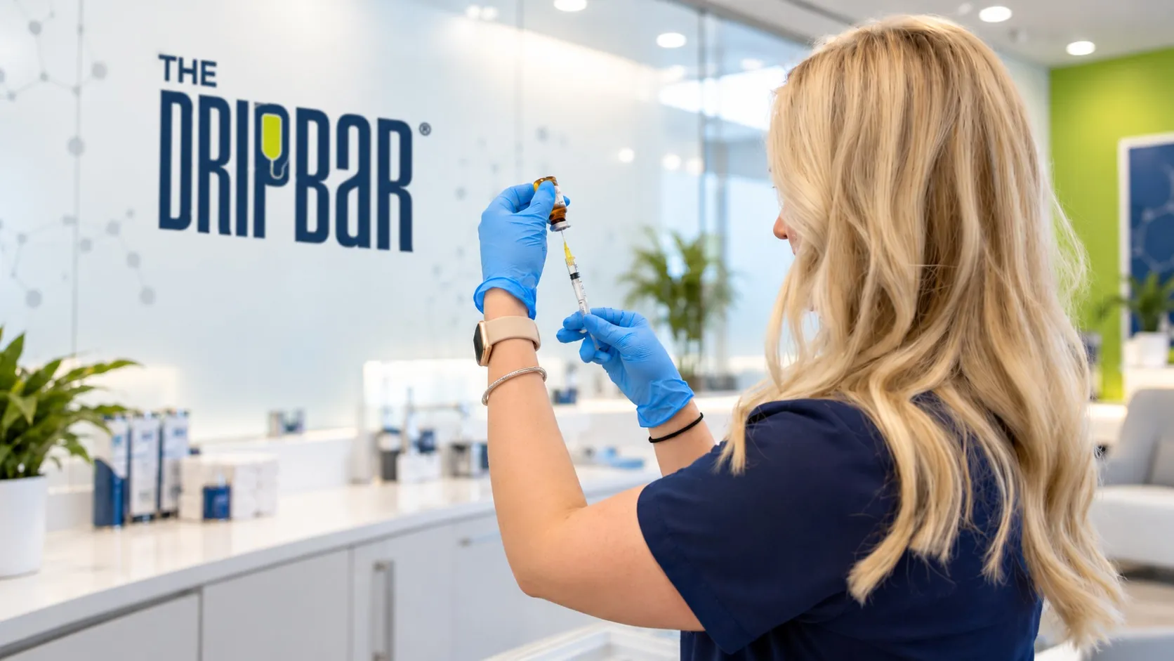 Registered Nurse preparing a vitamin injection at The DRIPBaR Flower Mound